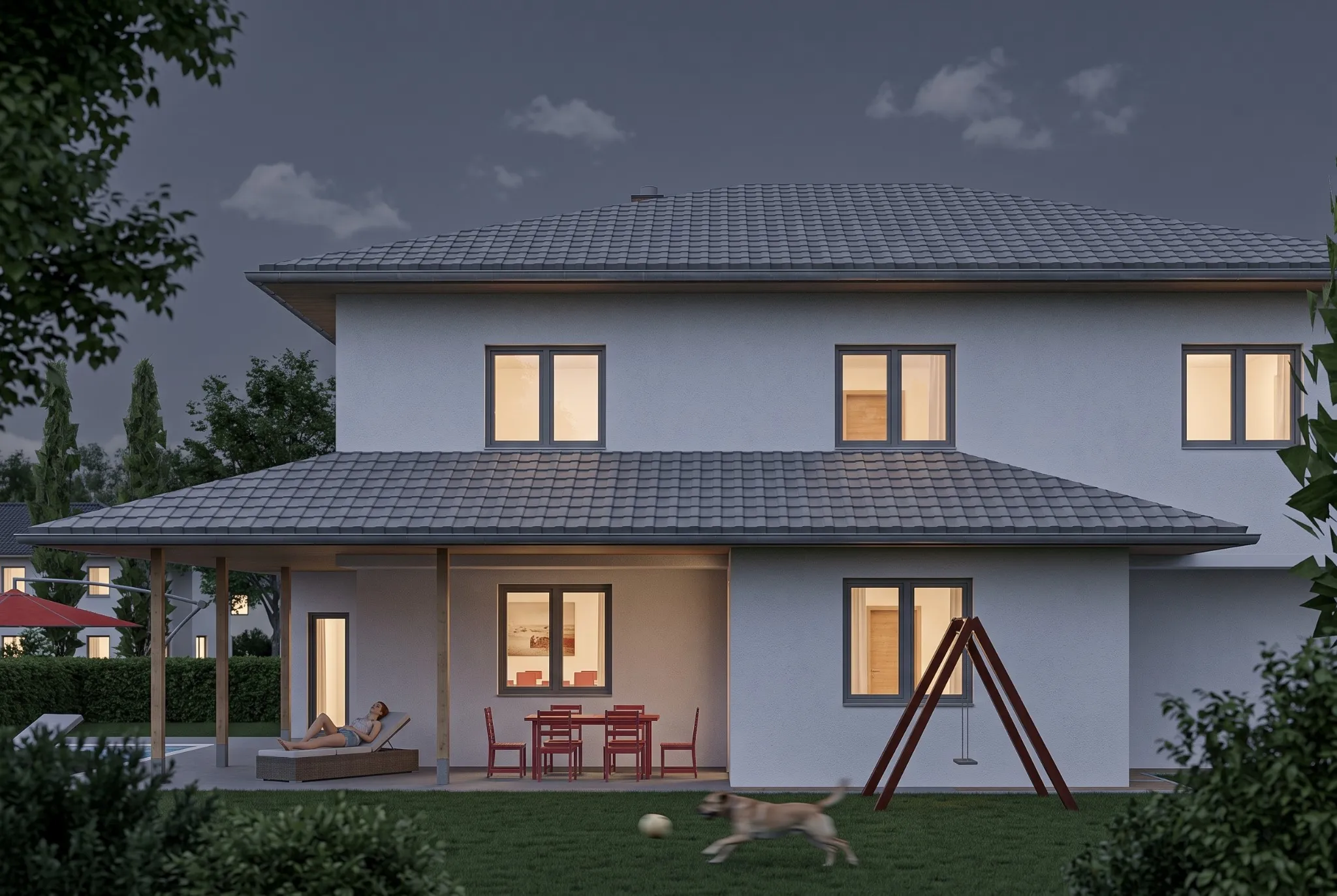 Haus mit zwei gestaffelten Dächern in der Abenddämmerung